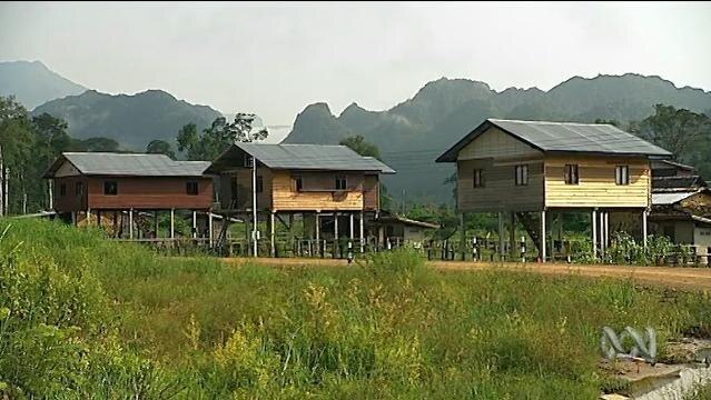 Stilt houses beside Mekong