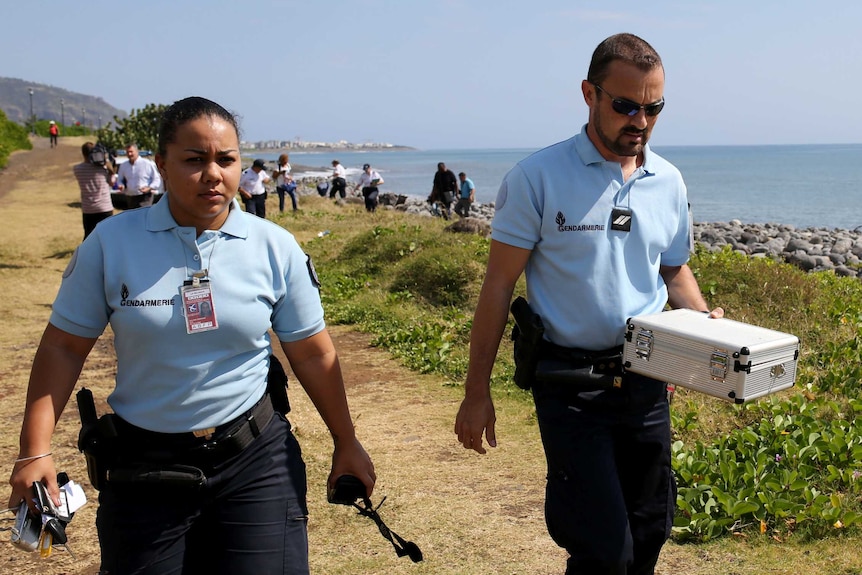 Reunion police remove metallic debris from beach