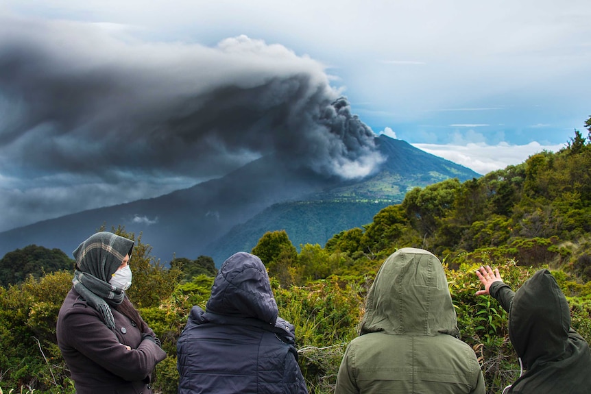 People look at Costa Rica's erupting Turrialba