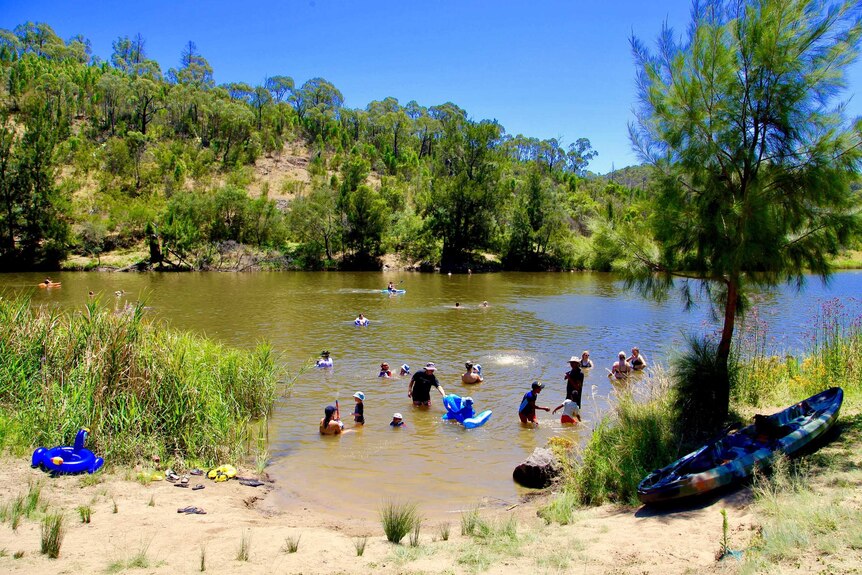 People swimming in the Murrumbidgee River in the ACT.