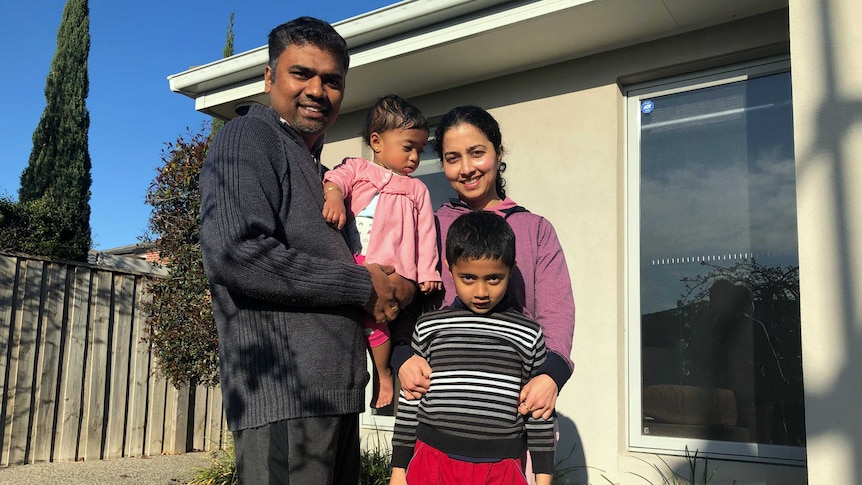 Aparna Hegde and Naveen Samrat with their two kids at the Point Cook home.
