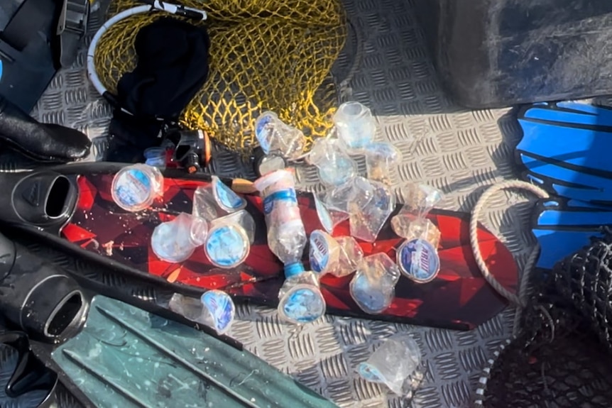Water bottles on a boat floor.