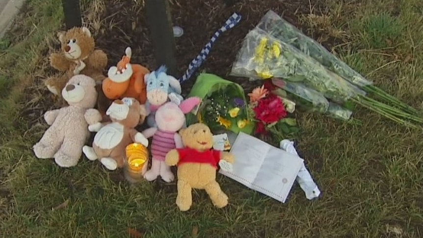 Flowers and toys left at the scene of Wyndham Vale crash