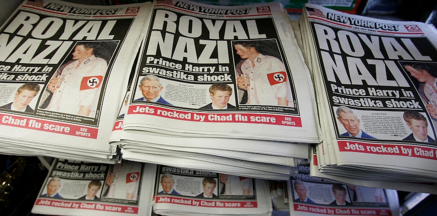 Newspaper featuring Prince Harry wearing swastika