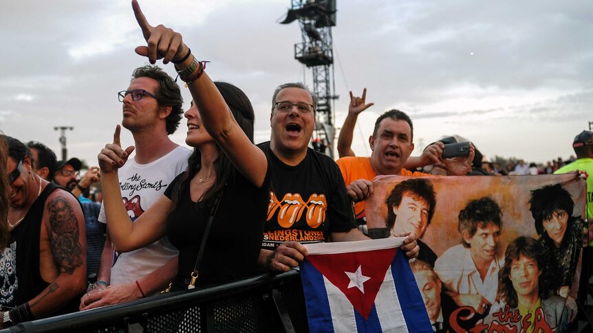 Cubans attend a concert by the UK rock band The Rolling Stones at Ciudad Deportiva in Havana, Cuba, on March 25