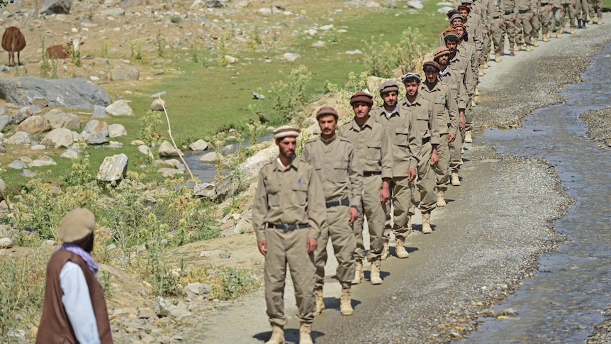 Newly absorbed personnel in the Afghan security forces take part in a military training