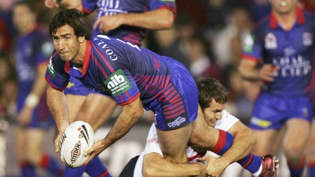 Andrew Johns looks for his support