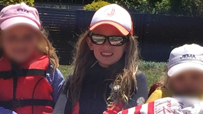 Pheobe wearing sunglasses at the beach