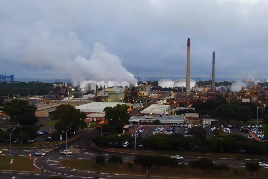 Smoke rises from a nickel refinery
