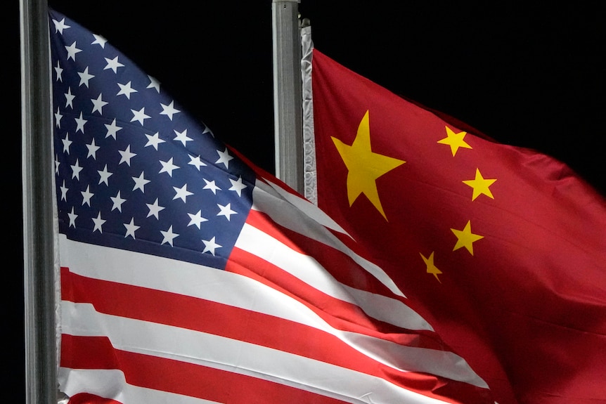 The American and Chinese flags wave at Genting Snow Park.