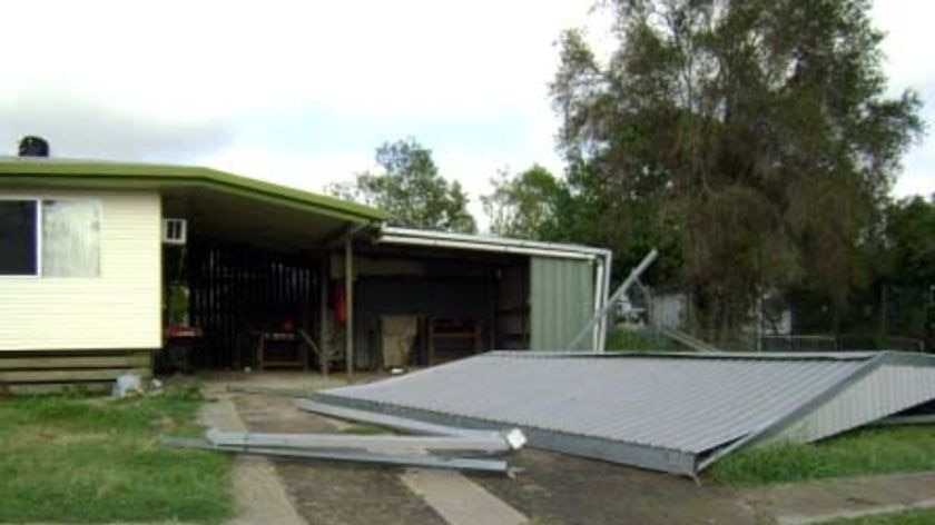 A roof lies on the footpath at Bremner Street in Blackwater.