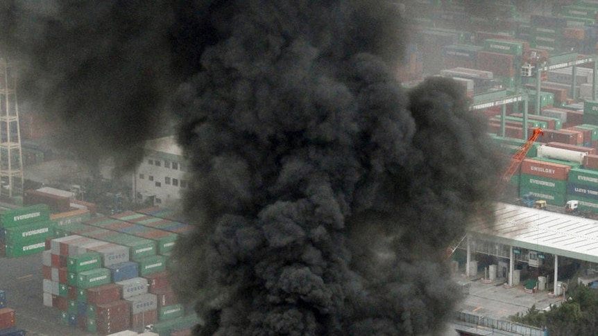 An office building burns in Tokyo after the earthquake