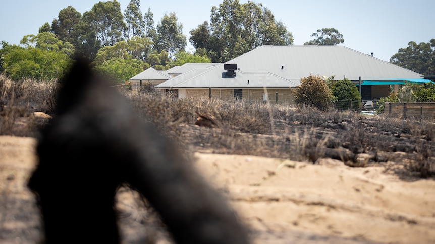 Burnt ground close to a house