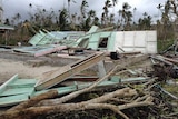 Remains of a building in the wake of Cyclone Evan in Samoa.