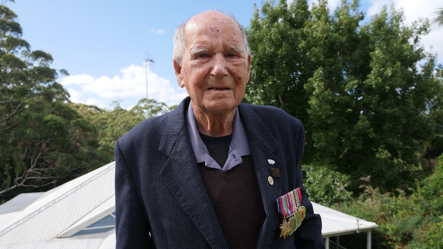 99 year old Second World War veteran, Jack Bartlett wearing his medals outside his Avoca Beach home. 