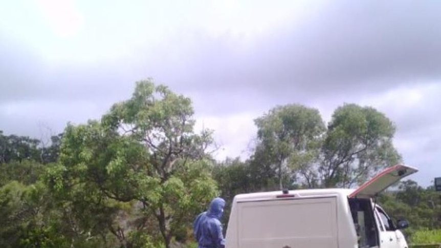 Forensic police at Emu Park near Yeppoon where two bodies were found.