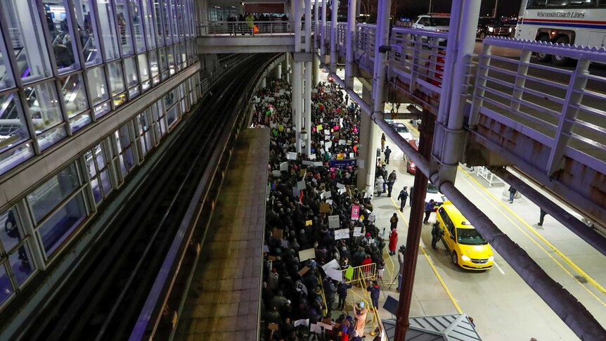 People gather outside Chicago's O'Hare international airport