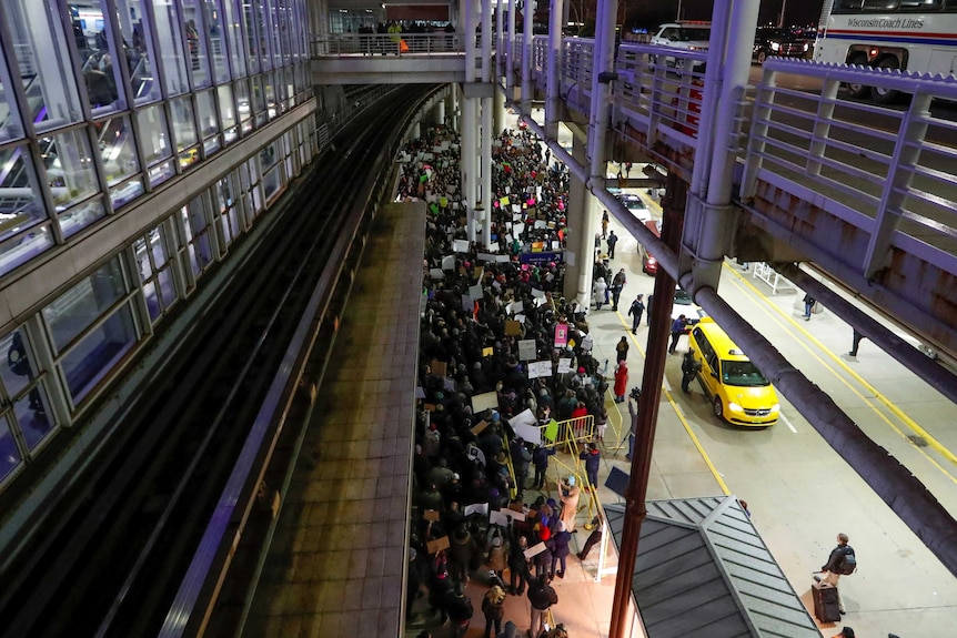 People gather outside Chicago's O'Hare international airport