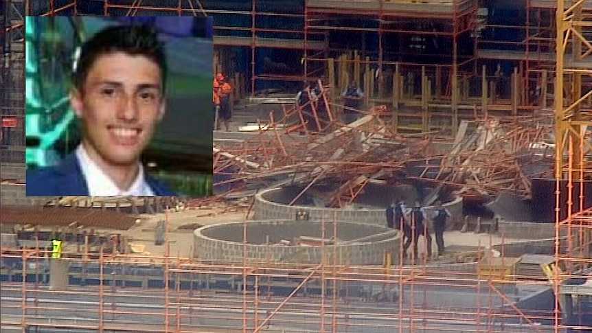 A young man wearing a suit inset, with a building site with a pile of crushed metal.