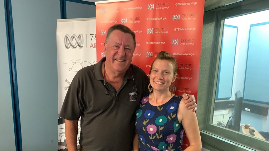 Wayne Kraft A-M stands with his arm around ABC presenter Alex Barwick after his interview