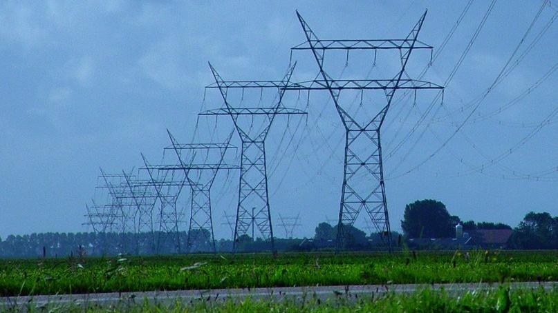A row of high-voltage transmission lines.