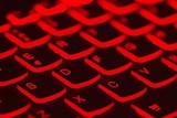 A keyboard with red light.