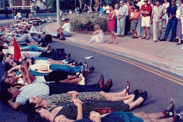 Darwin residents lie side-by-side in a city street in 1991 after news of the Santa Cruz massacre in Dili