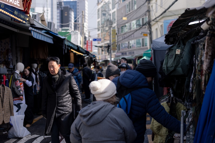Shot of people walking down a busy street in Seoul, South Korea