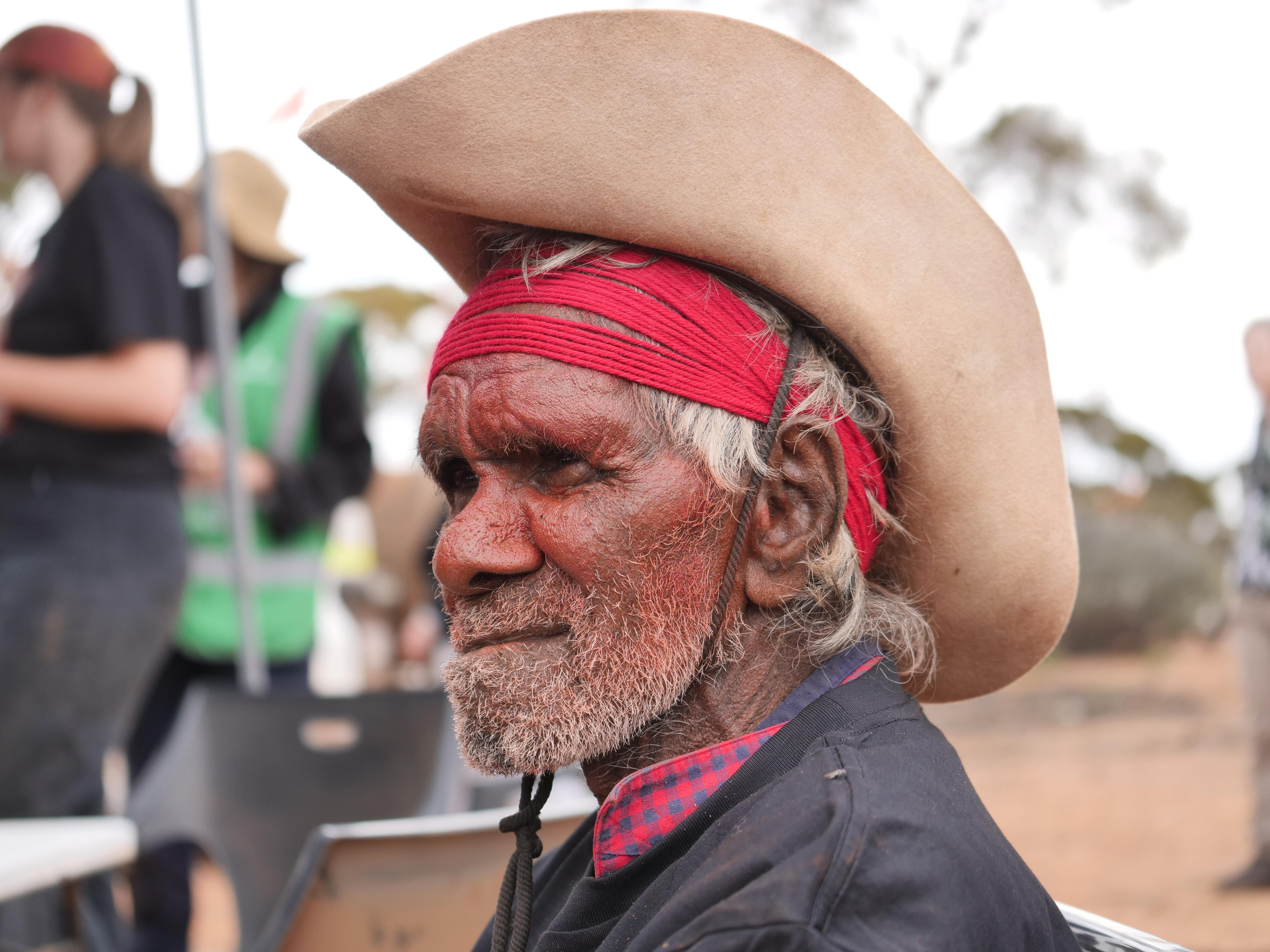 He has a big cowboy hat on