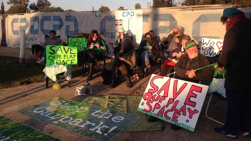 Bassendean Primary School parents blockade the car park site with a knit-in.