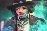 Portrait of Hendrix in elaborate dress with green smoke swirling behind