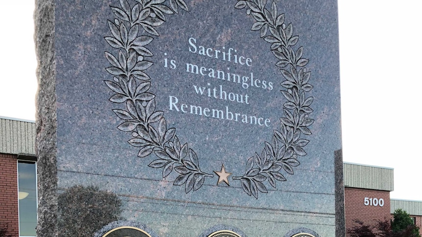 A marble memorial in Pittsburgh. The inscription says 'Sacrifice is meaningless without Remembrance."