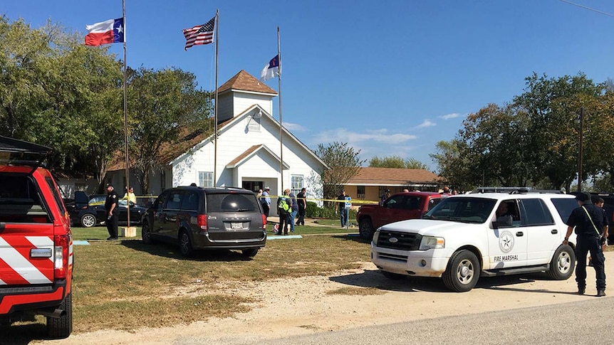 Emergency response vehicles outside the church in Sutherland Springs.