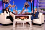 Meghan Markle and Ellen Degeneres sitting in chairs on the set of Ellen's talk show