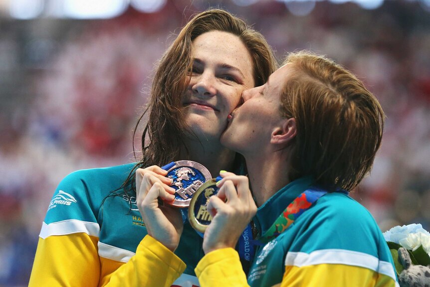 Savouring the moment ... Bronte (R) and Cate Campbell after medalling in the 100 metres freestyle at the 2015 world championships