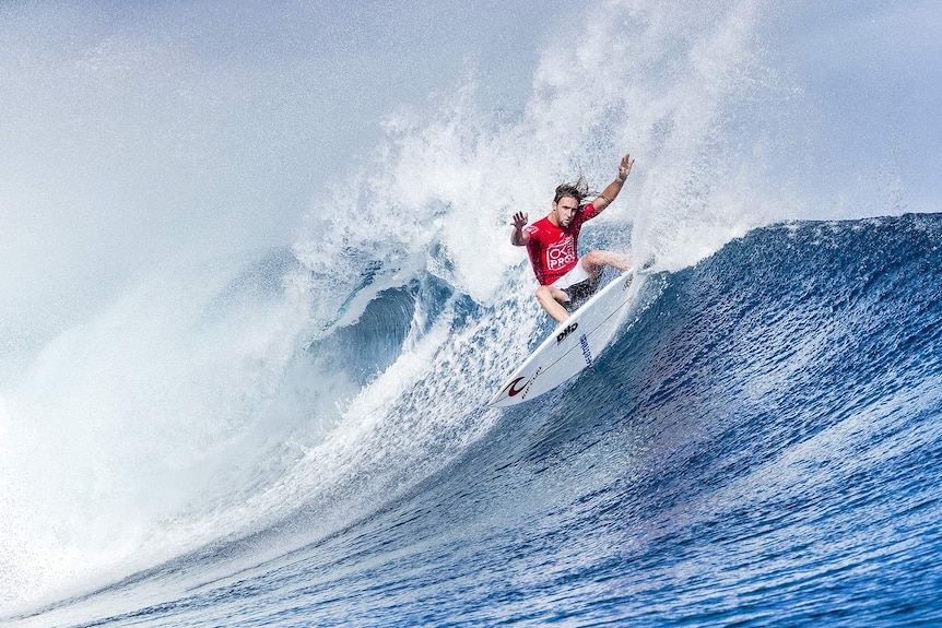Matt Wilkinson turning on a wave in Fiji.