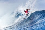 Matt Wilkinson turning on a wave in Fiji.