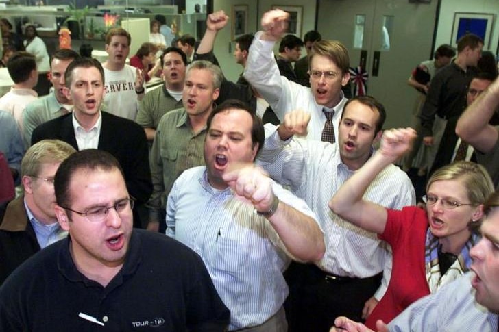 A group of men in business shirts shouting and pointing their fingers in an office