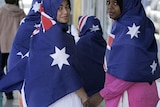 Muslim women wear the flag as hijab