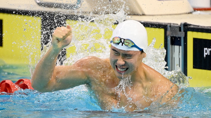 William Yang punches the water