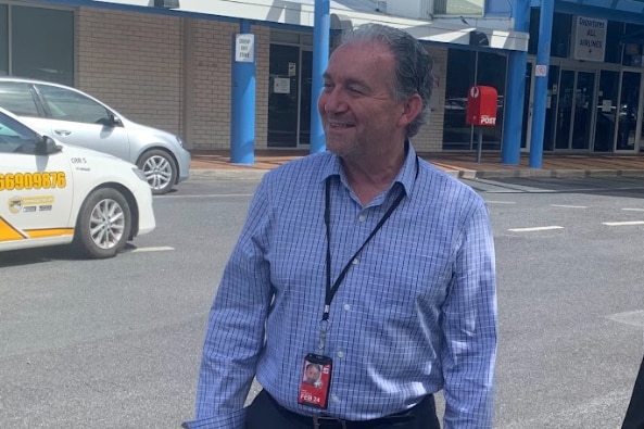 Coffs Harbour Airport General Manager Frank mondello wearing a blue shirt and smiling