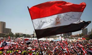300x180 - A flag flies at Tahrir Square on June 29, 2013