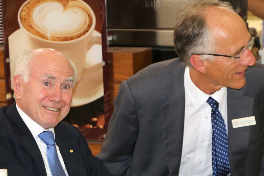 Former Prime Minister John Howard with Southern River MP Peter Abetz at a shopping centre in Mr Abetz's electorate.