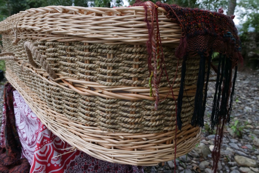 Hand woven willow and wicker coffin for natural bush burials.