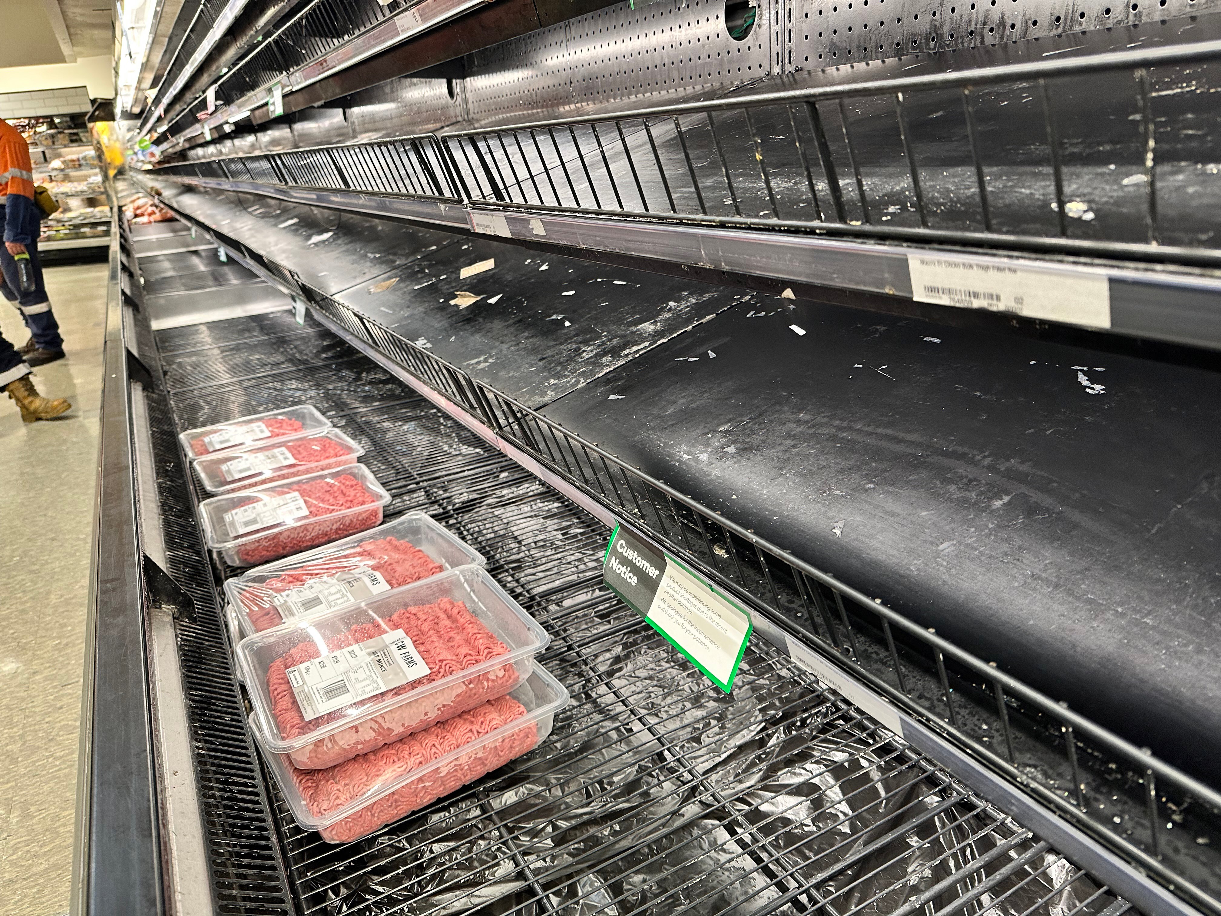 Supermarket shelves stripped bare in north Queensland as warnings about