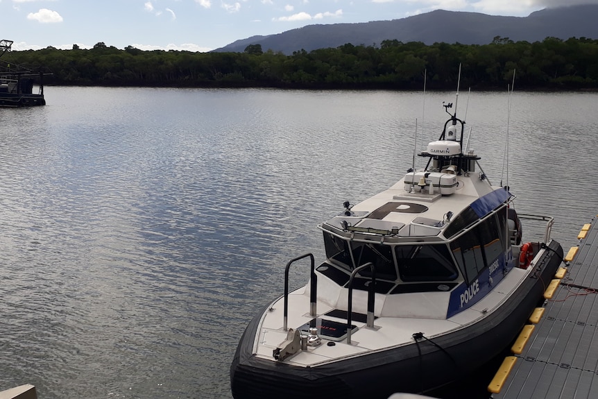 A small police boat in a creek