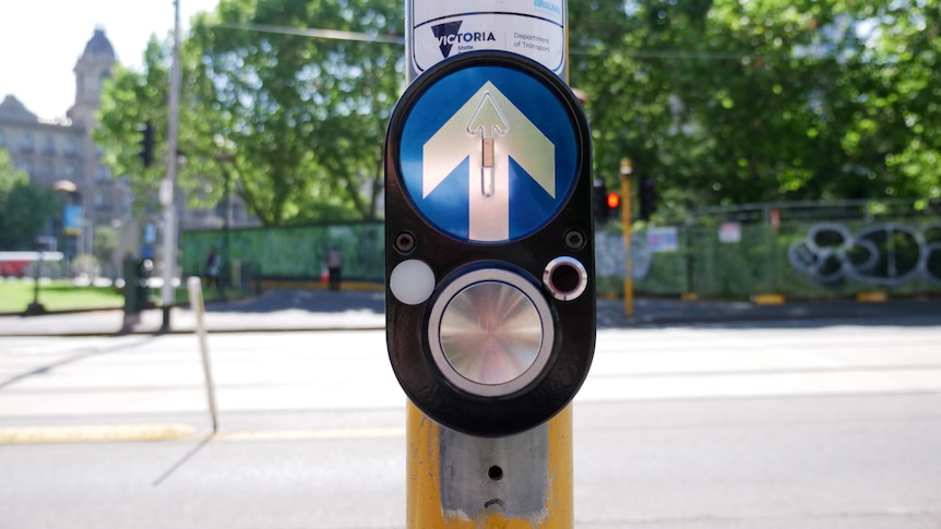 Photo of a pedestrian crossing button