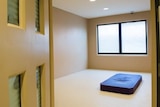 Seclusion room with mattress on floor in yet-to-be opened K-Block mental health facilities.