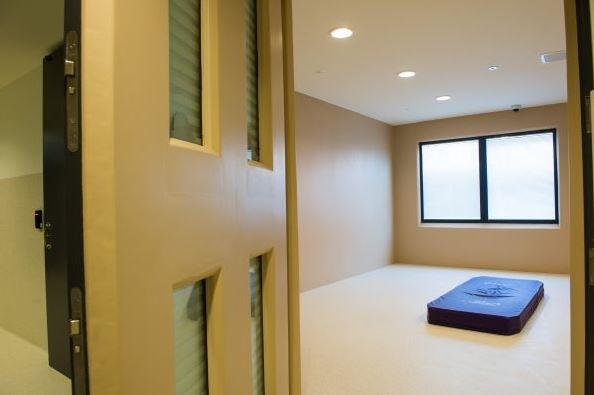 Seclusion room with mattress on floor in yet-to-be opened K-Block mental health facilities.