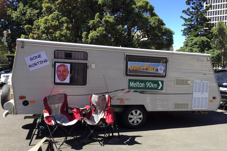 A caravan outside Parliament makes fun of Melton MP Don Nardella